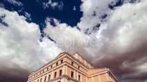 Large White Cloud In The Blue Sky Over The Building Of The Theater. Kazakhstan by Timelapse4K