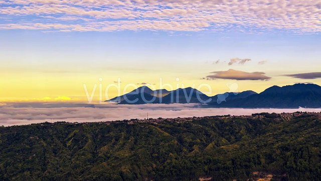 Panorama Of The Mountains Covered With Clouds in Bali, Indonesia by Timelapse4K