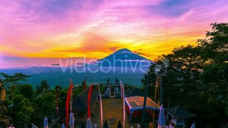 Sunset On The Background Volcano Gunung Agung in Bali, Indonesia by Timelapse4K