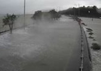 Road Closed by Floodwaters as Heavy Rain Drenches Auckland