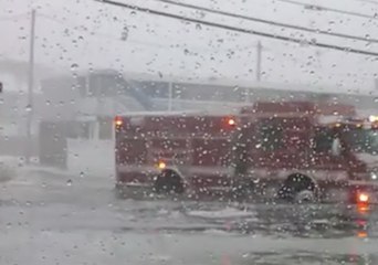 Firefighters Drive Truck Through Floodwaters in Hampton Beach