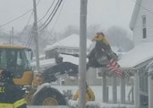 Loader Rescues People Trapped by Frozen Floodwaters in Hull, Massachusetts