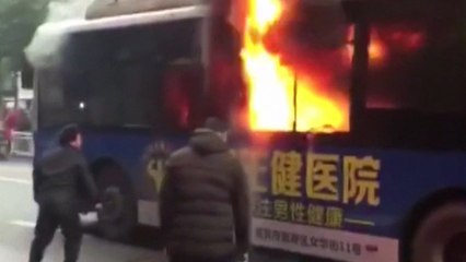 Elderly person trapped on burning bus rescued by passerby