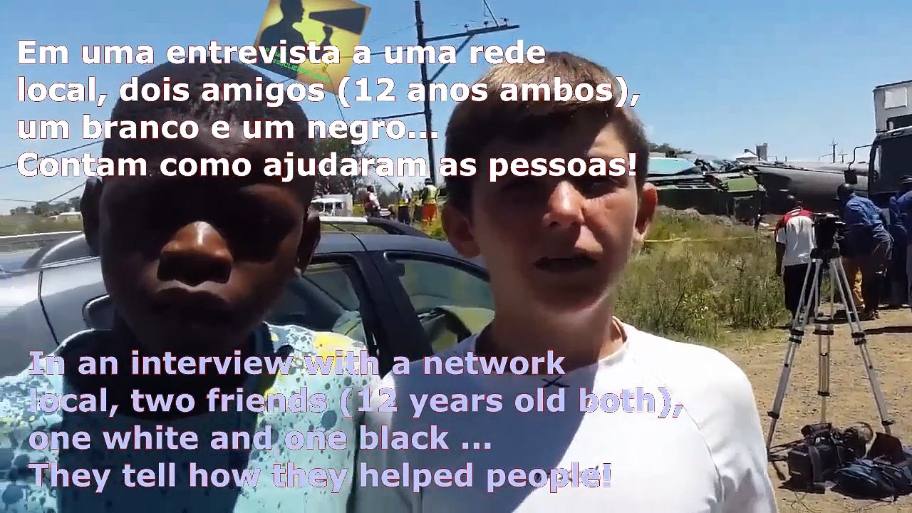 TRAIN runs over truck and catches fire. BOYS Black and White give humanitarian lesson