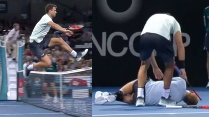 Grigor Dimitrov JUMPS the Net to Help After Opponent Goes Down with Injury