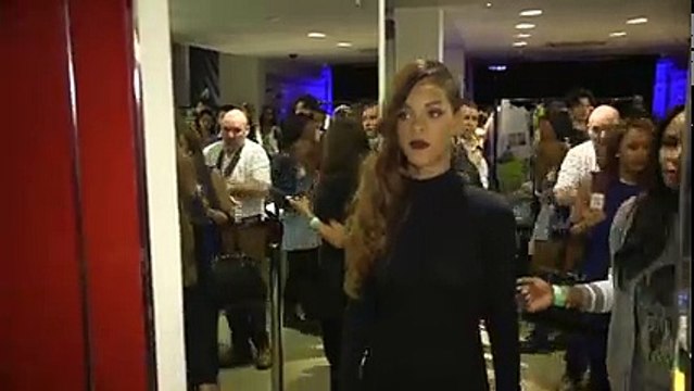 Rihanna surprises a lucky fan at Rihanna for River Island launch