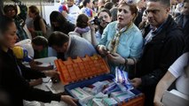 Caracas Shops Mobbed As Venezuela's Maduro Forces Price Cuts