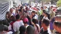 Multidões à porta dos supermercados na Venezuela