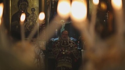Cristianos palestinos acuden a misa de Navidad ortodoxa en Gaza