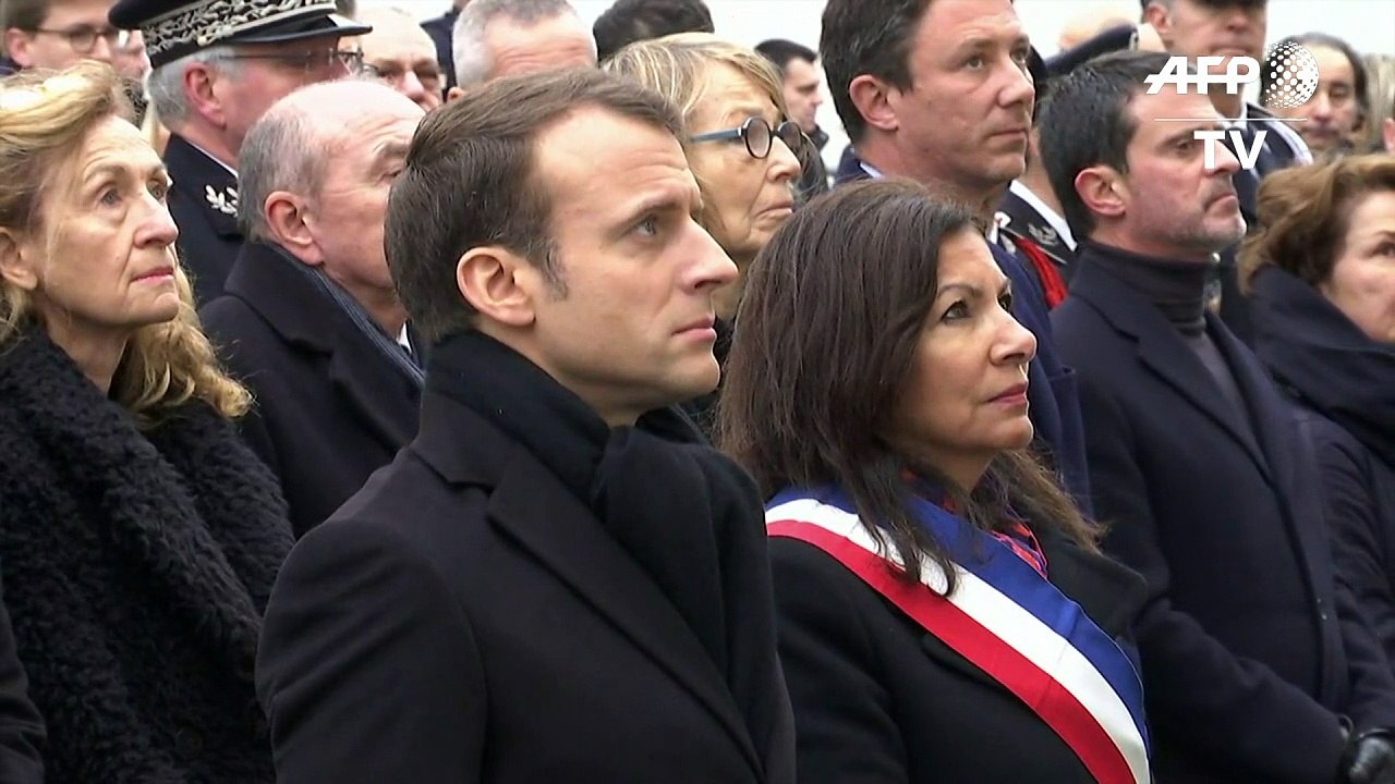 French president Macron pays tribute to Charlie...