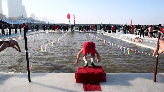 Swimmers brave cold in ice swimming contest in Harbin, China