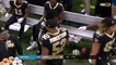 New Orleans Saints running back Alvin Kamara hands out Air Heads to his teammates following TD
