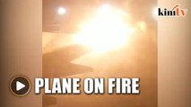 Plane catches fire after collision at Toronto airport
