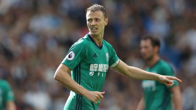 Arsenal can't compete with Man City for Jonny Evans - Wenger