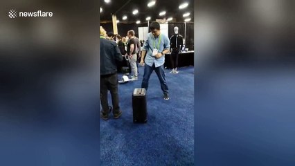 Self-driving luggage follows man around CES 2018