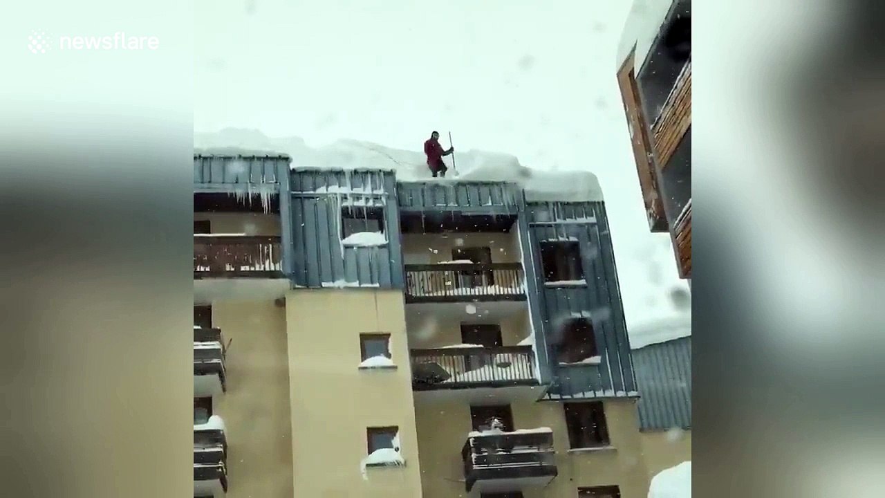 Man shovels snow off roof in French Alps resort where Briton went missing