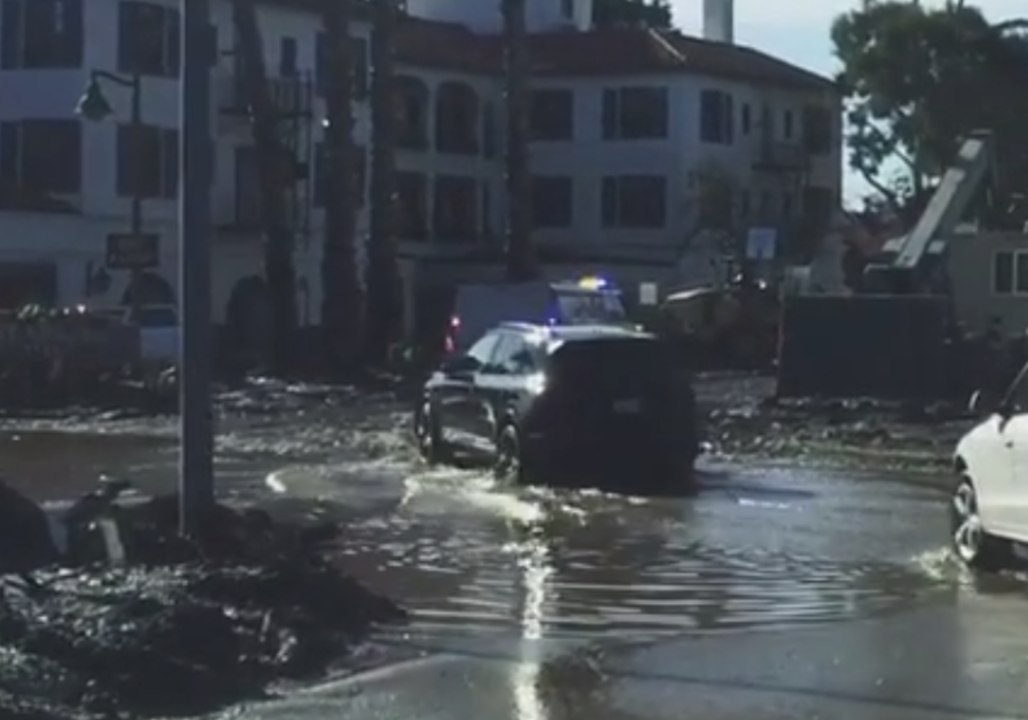 Montecito Residents Drive Through Flooded Neighborhood Following Storm
