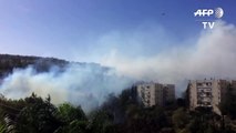 Hundreds evacuated as bushfires near Israel's Haifa-TOGXFggV020