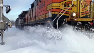 2 trains hit a HUGE snow pile!!!