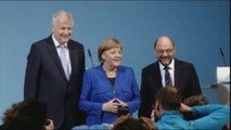 Merkel y Schulz cierran in extremis un preacuerdo para nueva gran coalición