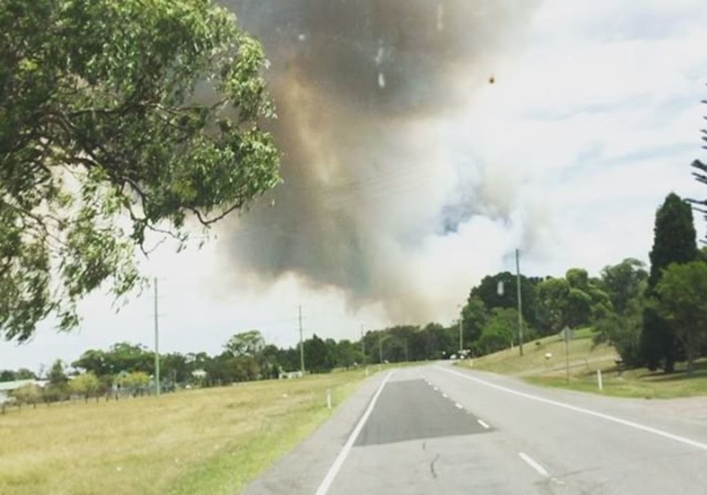 Smoke Rises From Bushfire Burning Near Tomago