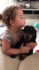 Little Girl Loves Her Puppy