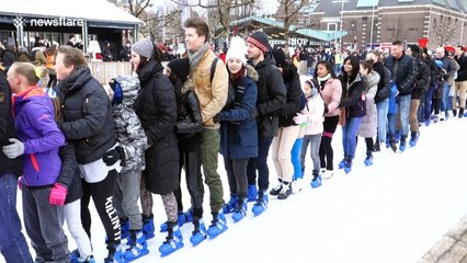 Skaters attempt to break world record for conga line on ice