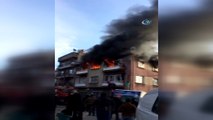 Alev alev yanan binaya itfaiye ve vatandaşlar müdahale etti