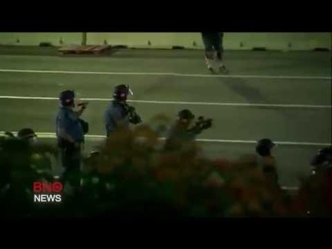 Dozens arrested at rally in Minnesota after throwing rocks and bottles at police