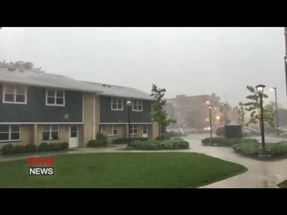 RAW: Wall Cloud Moves Rapidly over Chicago Skyline