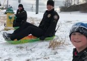 Tennessee Police Officers Challenge Local Kids to Sled Race