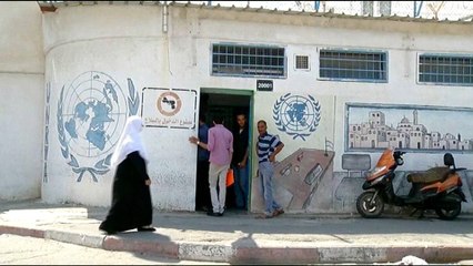US cuts UNRWA funding by more than half