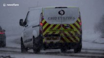 Vehicles battle through snow in Northern Ireland