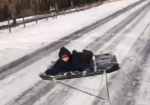 Homemade Sled Gets Towed Through Alabama Snow