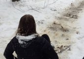 Woman Uses Makeshift Sled to Enjoy Snow Day in Chapel Hill