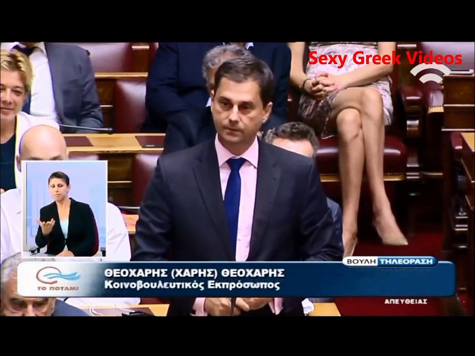 MEGA OOPS for greek politician in background! Embarassing and HOT