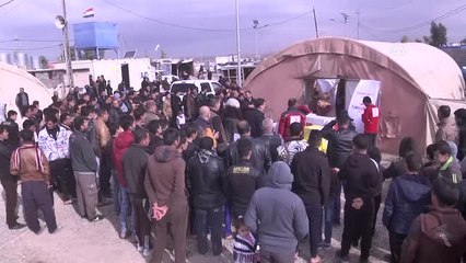 Türk Kızılayı'ndan Türkmen Göçmenlere Kış Kıyafeti Yardımı