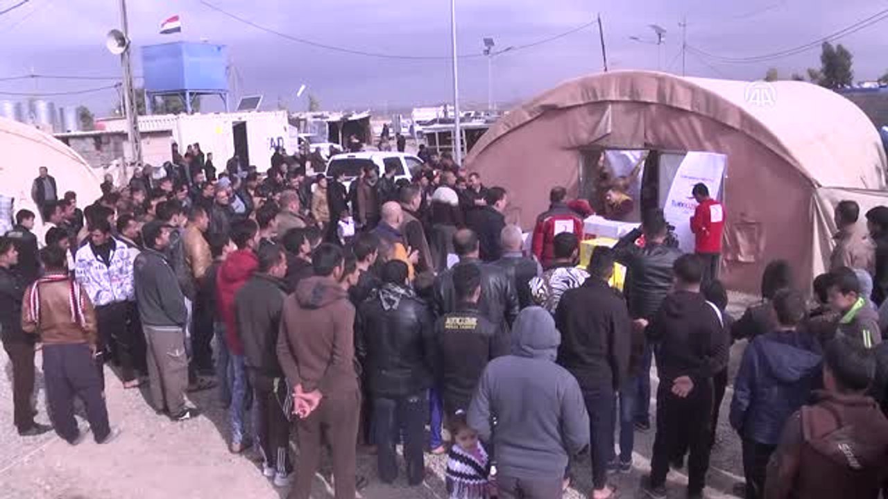 Türk Kızılayı'ndan Türkmen Göçmenlere Kış Kıyafeti Yardımı