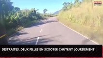 Distraites par un motard, deux filles en scooter chutent lourdement (vidéo)