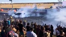Crowds sprayed with burning fuel at a drag racing event