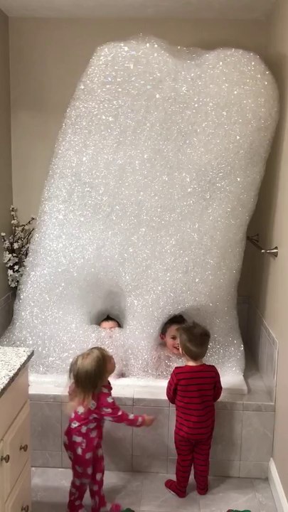Kids Make Bubble Tower in Bath Tub