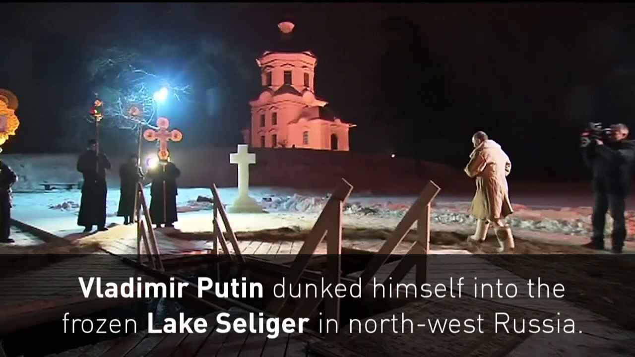 Topless Putin dips into icy lake to mark Jesus' baptism