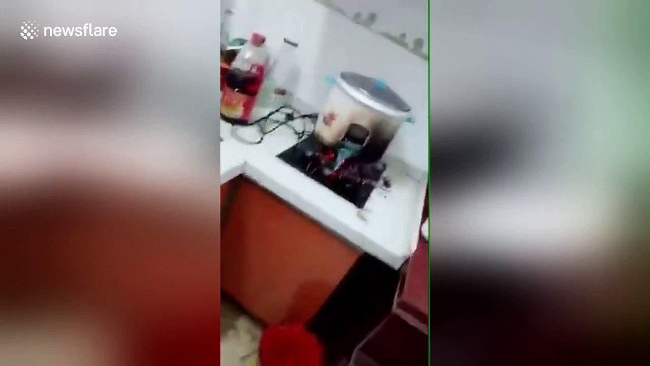 Grandmother in rural China uses FIREWOOD on electric cooker