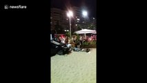 Scene from the beach after car hit Copacabana pedestrians