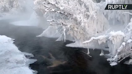 German Tourist Takes Icy Plunge in Coldest Town on Earth