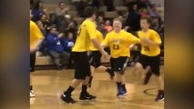 Watch heartwarming video as team cheers boy with Down Syndrome scoring in basketball game
