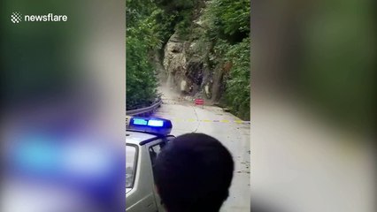 Dramatic video shows mountainside collapse after heavy rain in southern China