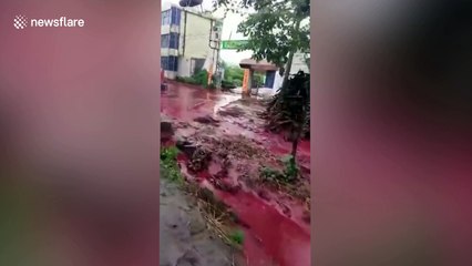 River turns blood-red due to leak at mineral waste warehouse