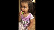 Adorable 2-year-old girl thinks licking a lime is the funniest thing ever