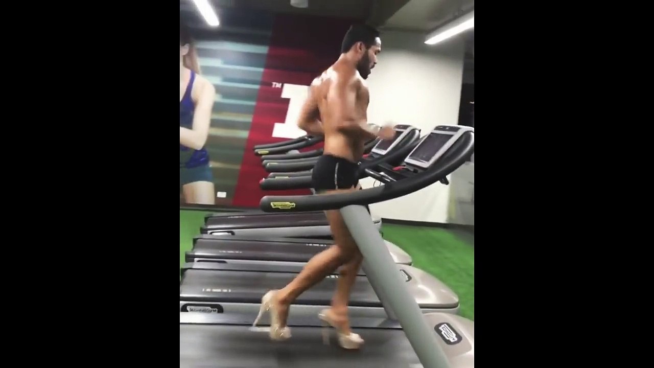 Man High-Heeled Threadmill Walk - Guy On Treadmill Wearing High-Heels